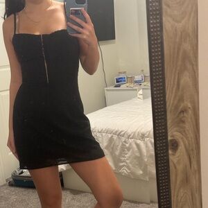 small black mini dress with floral embroidery and lace